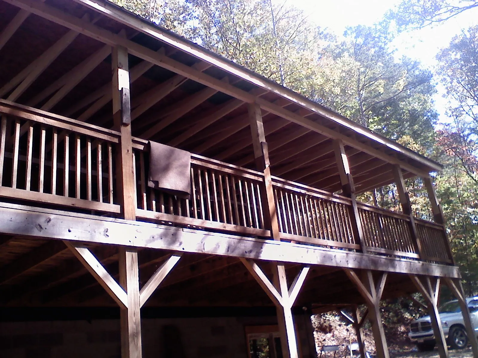 Timber framing under a new elevated porch and deck — Roof Leak Repair in Carriere by Roofing Brothers